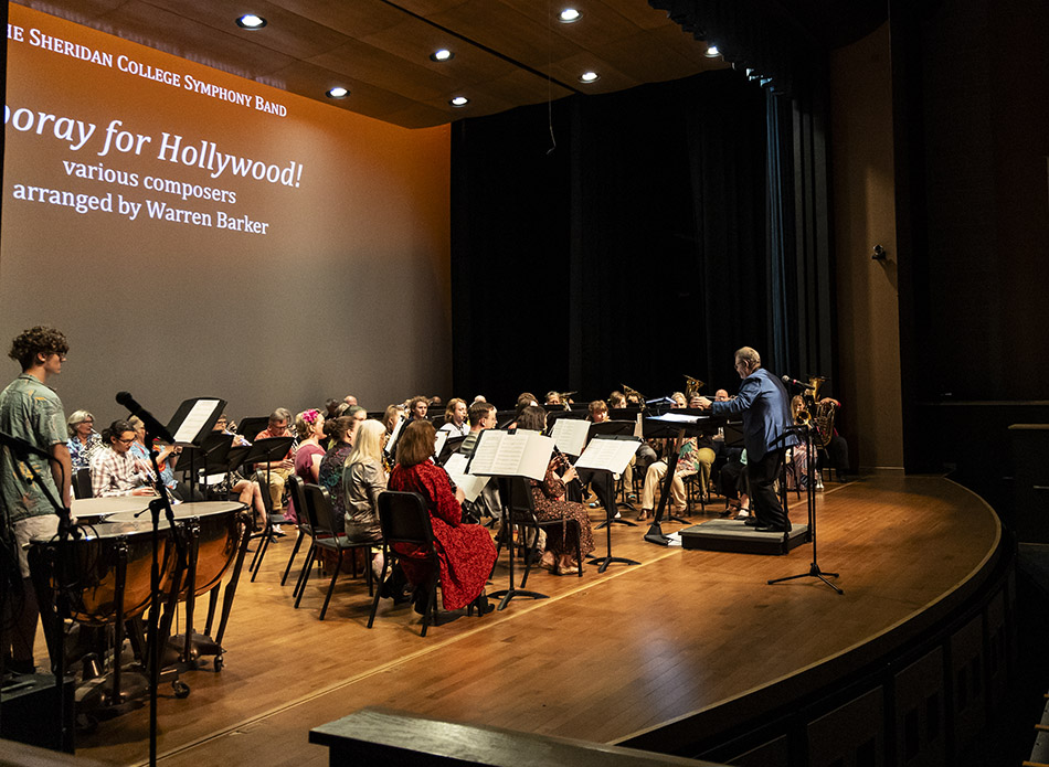 Photo of the Sheridan College Symphony Band performing during the Spring POPS concert in 2024.