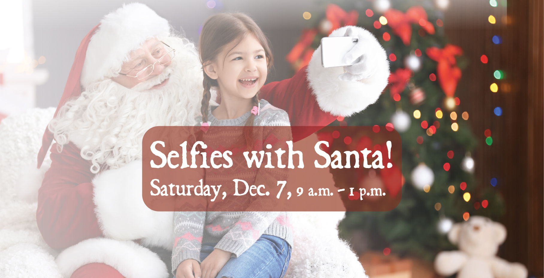 Selfies with Santa event image with Santa and a little kid taking a selfie.