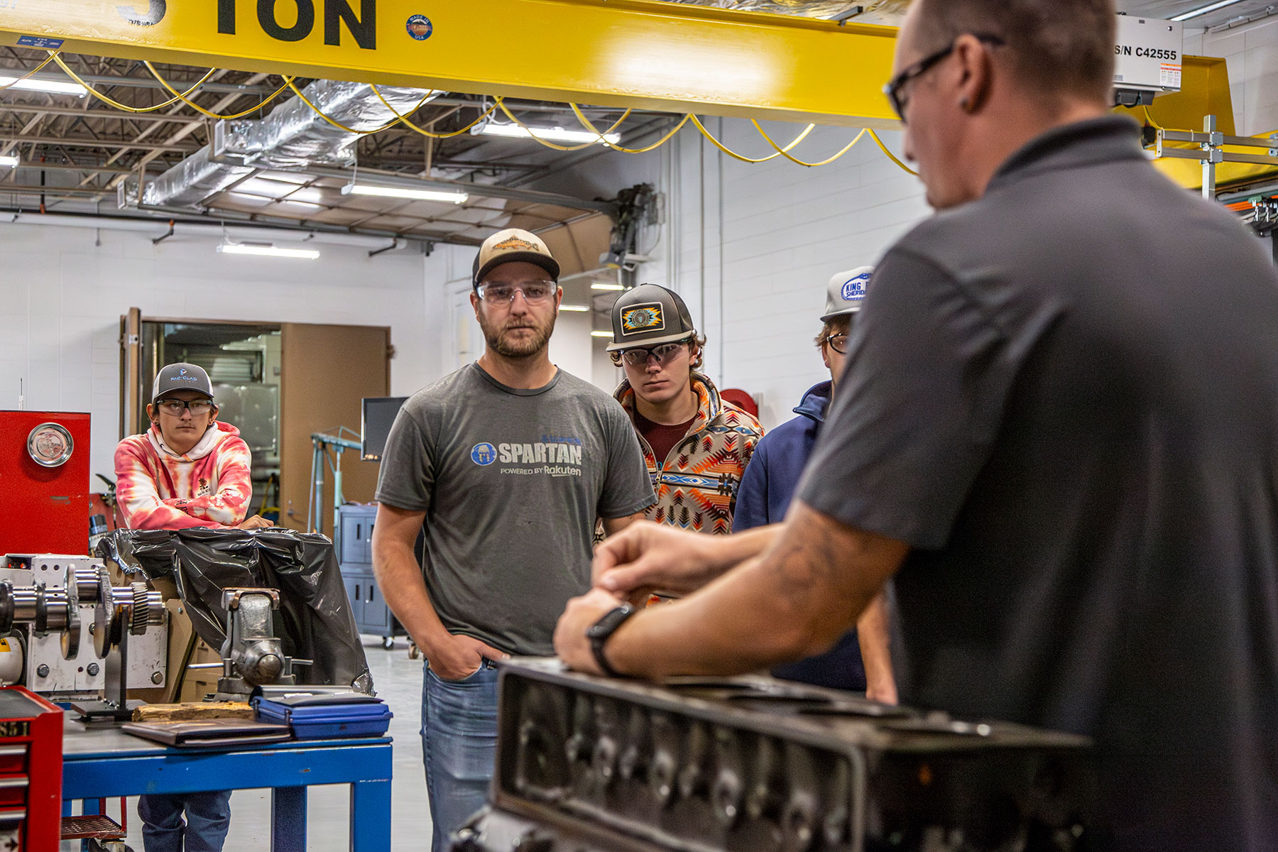 Sheridan College Diesel Technology instructor and students in class photo