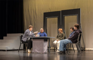 Several Sheridan College Theater students on stage during a scene