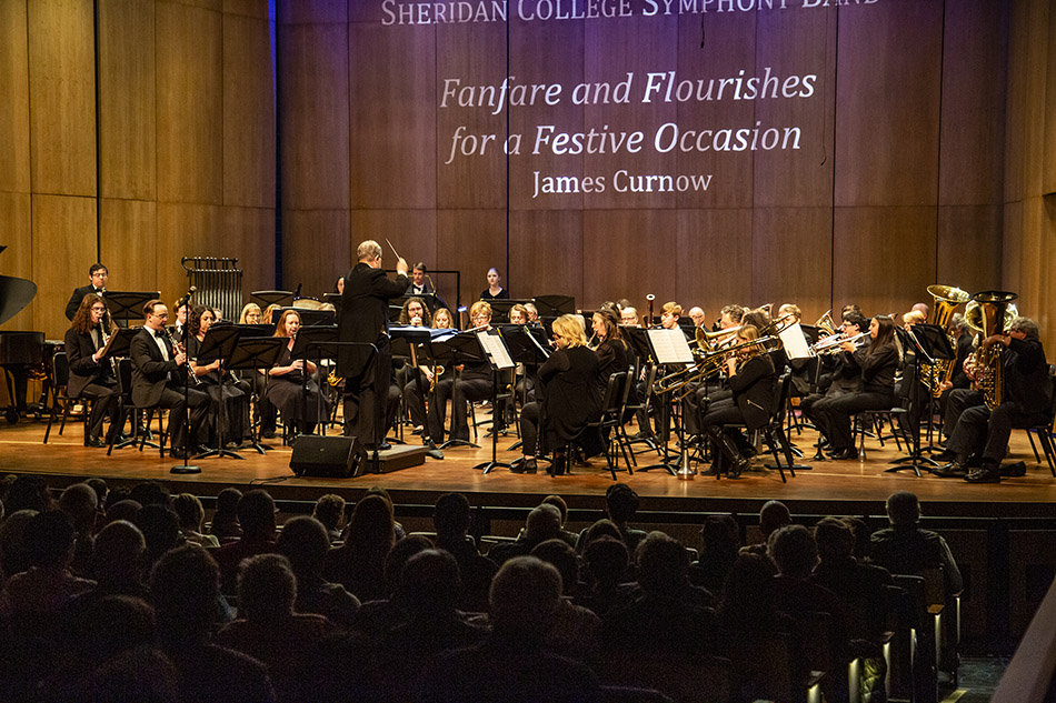 Photo of Sheridan College Symphony Band performing in Kinnison Hall