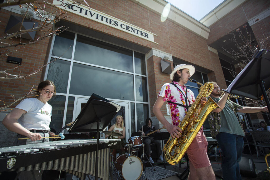 Image of jazz band performing during lunch outside acitivity center