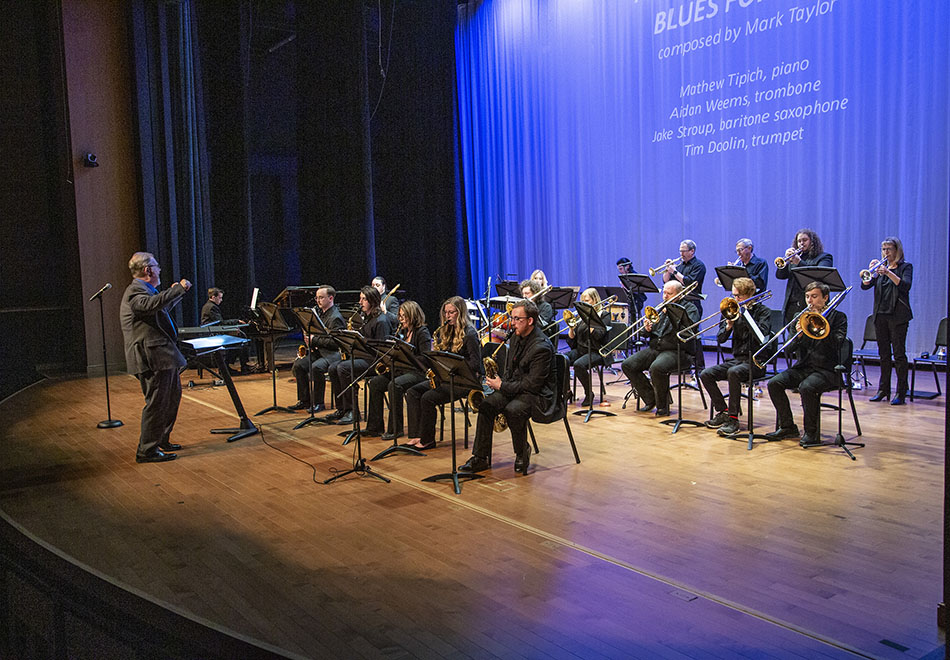 Image of the Sheridan College Jazz Ensemble Big Band performing on the Kinnison Hall Stage