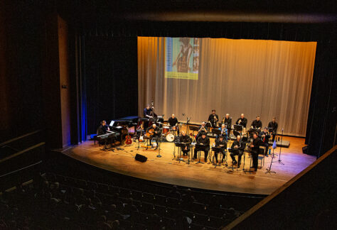 Photo of the Bighorn Jazz Orchestra performing on stage in Kinnison Hall