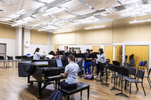 vocal students practicing in the choral room