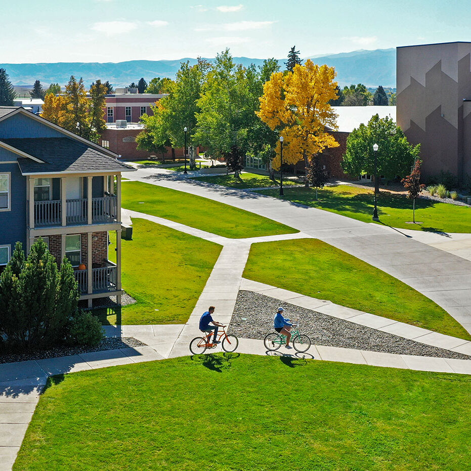 Sheridan College campus with students riding bikes