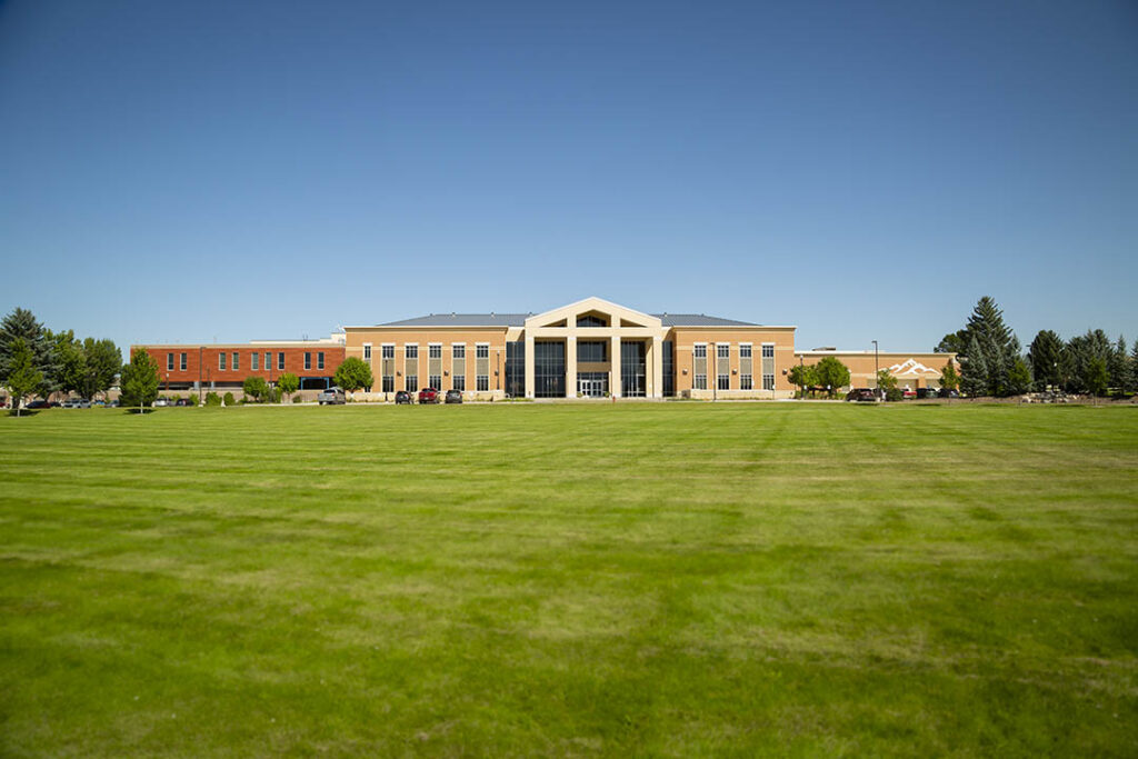 Photo of the front lawn and Whitney Academic Building