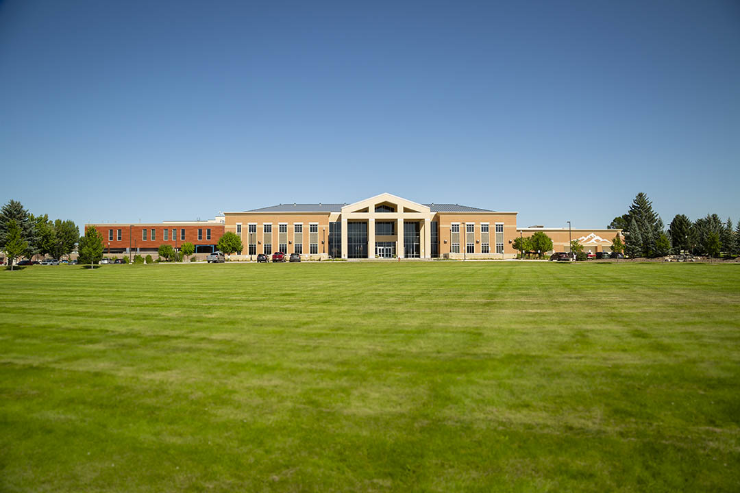 Photo of the front lawn and Whitney Academic Building