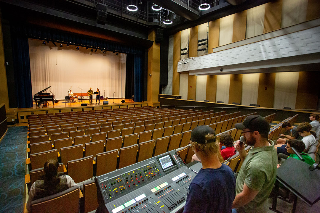 Music Tech students in Kinnison Hall learning about Live sound